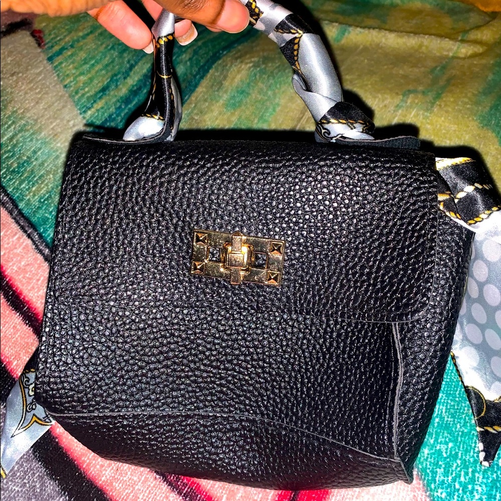 Black leather mini purse never wore before